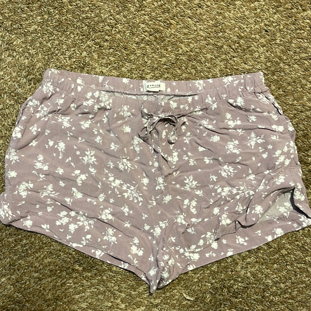 Garage lilac and white floral tie shorts. Viscose material. Size medium.